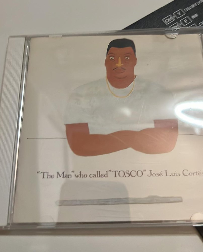 The front cover of the CD “The Man” who called “TOSCO.”